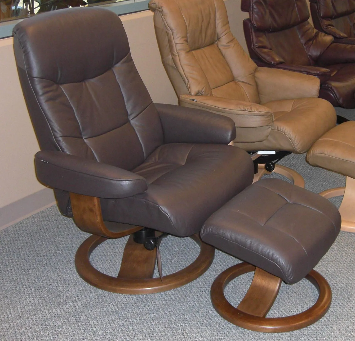 Large Leather Swivel Recliner Chair with Ottoman in Havana Dark Brown NL 120 Nordic Line Leather with a Cherry Wood Stain Base