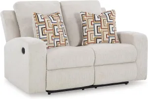 Signature Design by Ashley Danum Modern Tufted Manual Reclining Loveseat with 2 Accent Pillows, Beige