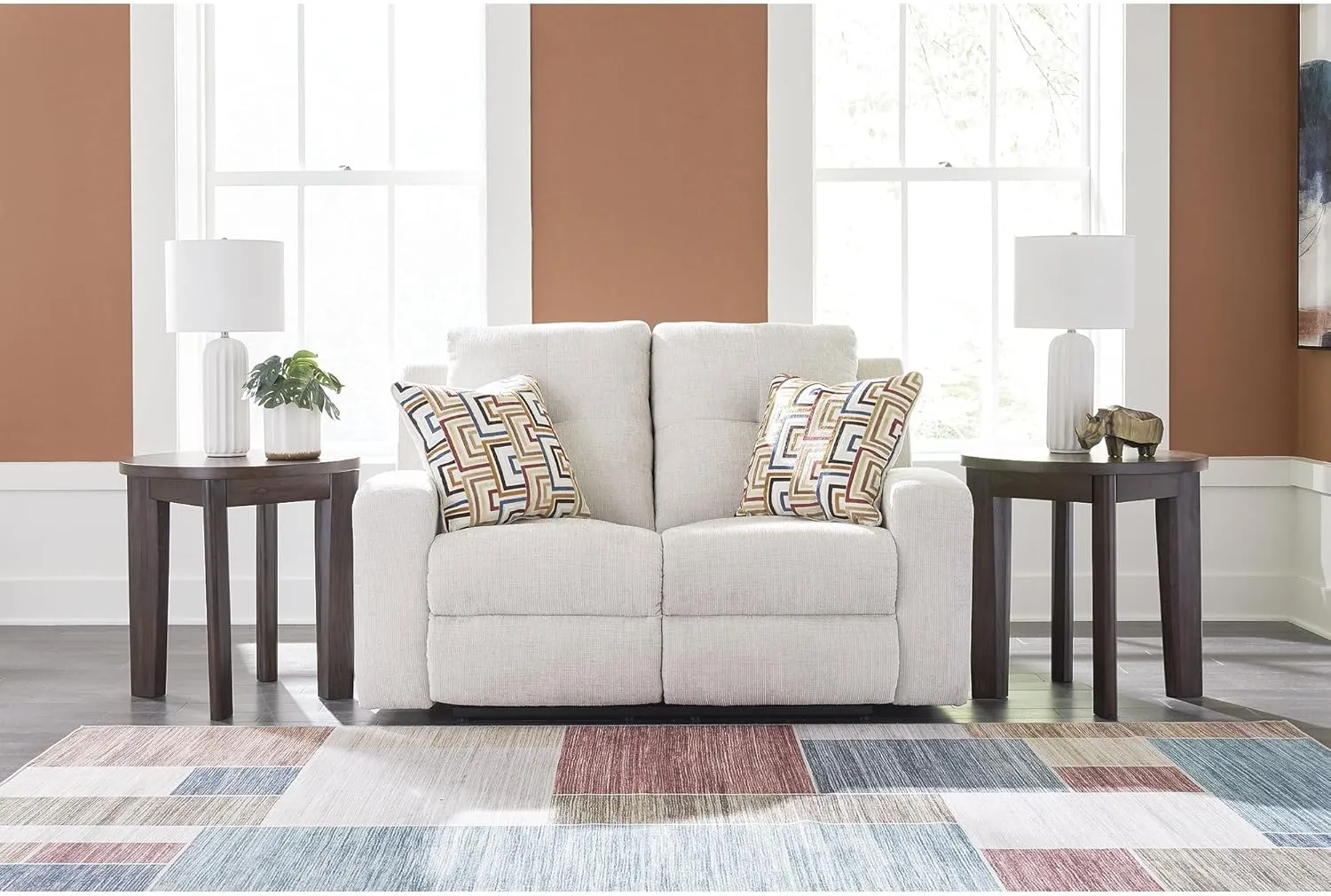 Signature Design by Ashley Danum Modern Tufted Manual Reclining Loveseat with 2 Accent Pillows, Beige